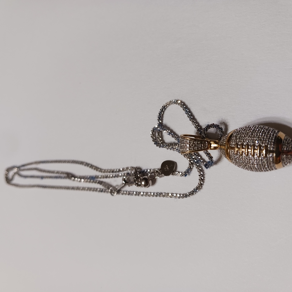 Elegant Gold and Silver Pendant Necklace